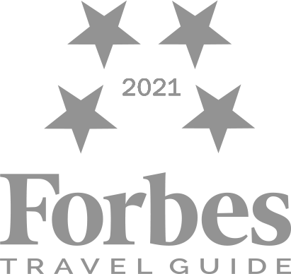 Four Star Forbes Travel Guide Logo