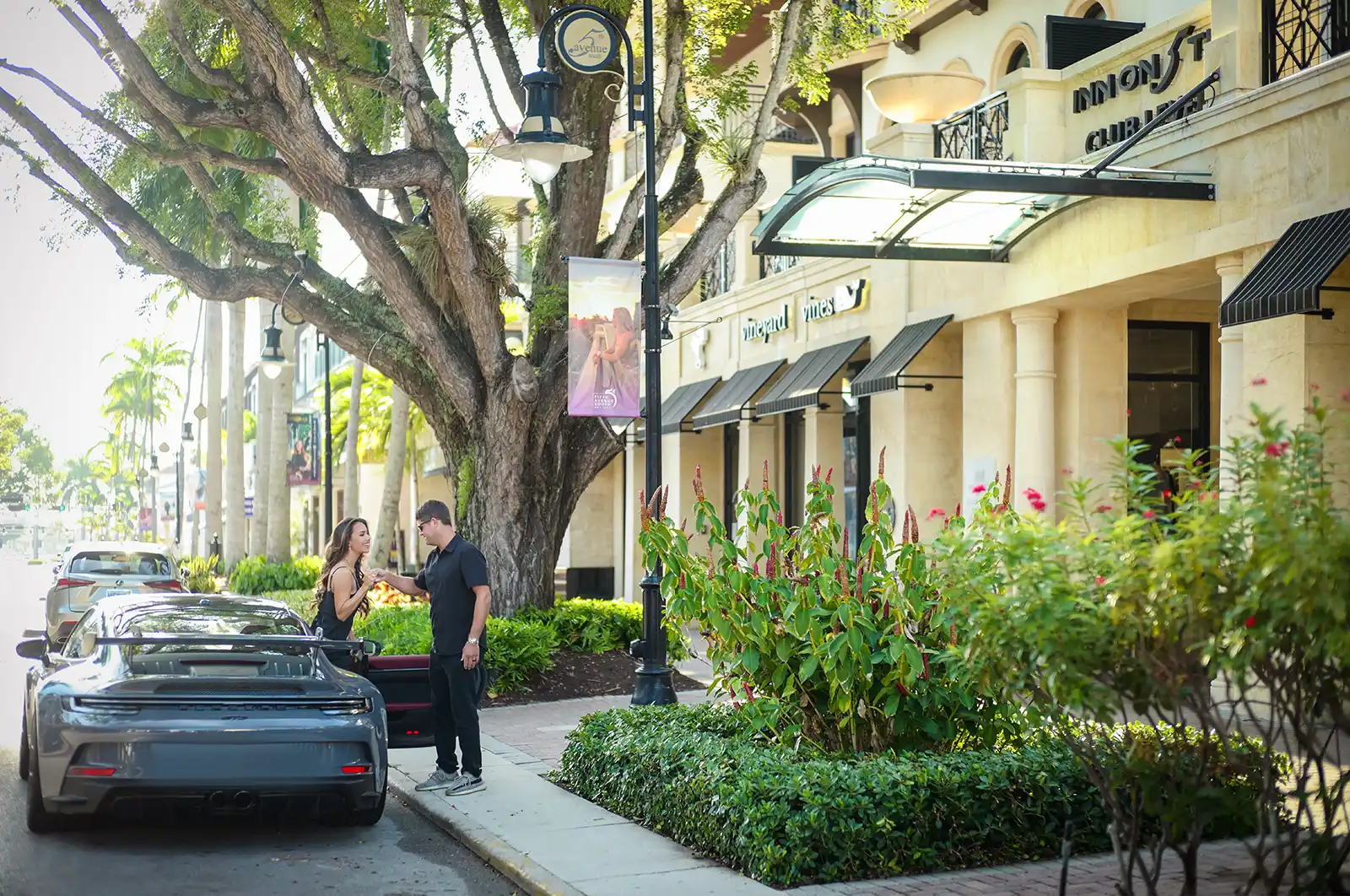 car guest in front of hotel